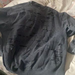 Distressed sweater